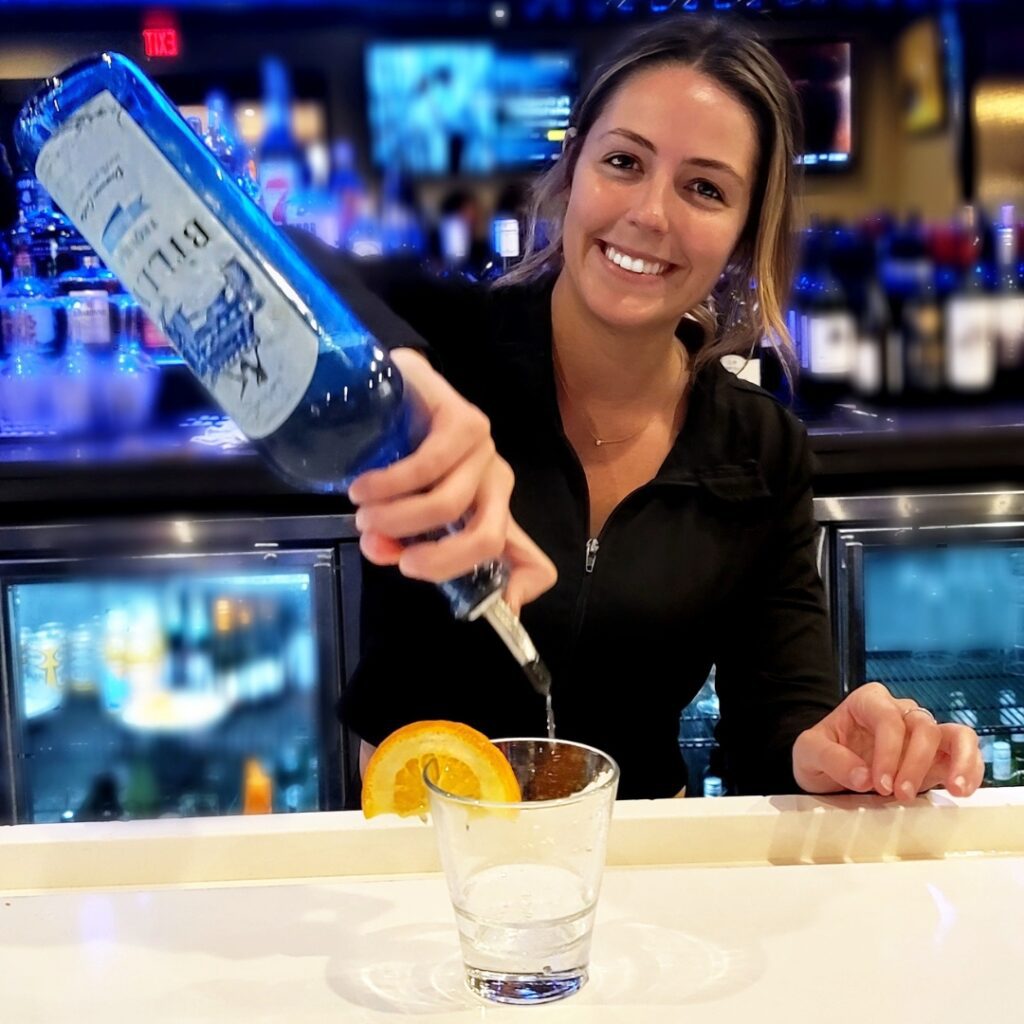 Female Bartender Pouring Billys